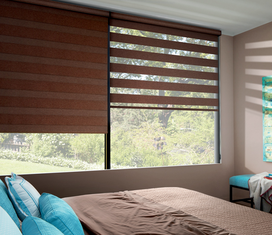 brown master bedroom with turquoise bedding and hunter douglas brand banded shades Rocky River