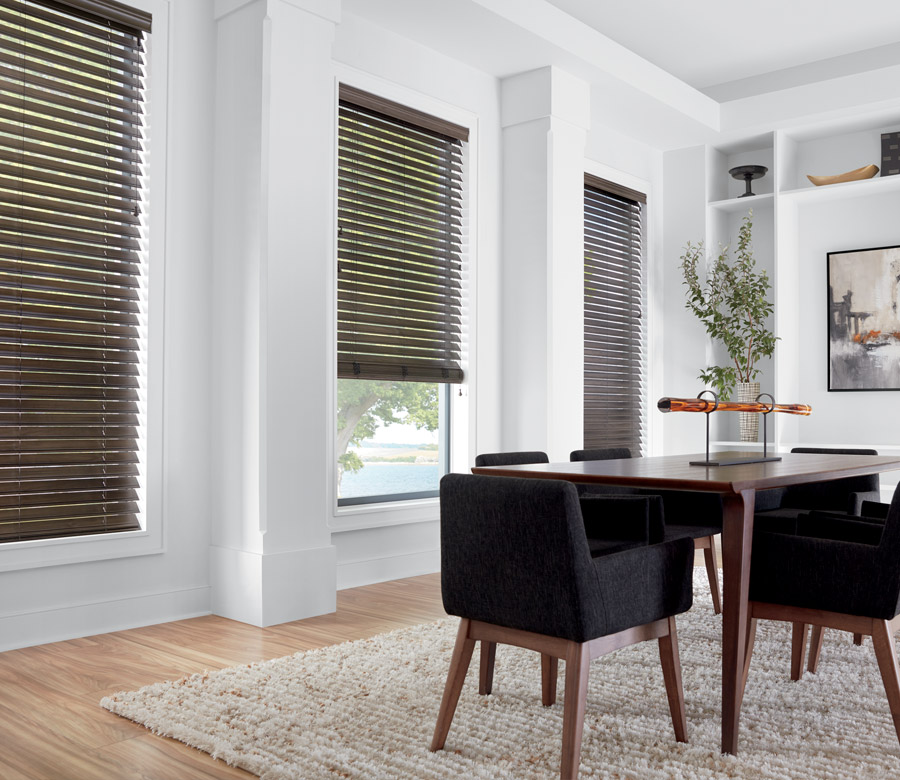 Cleveland OH dining room with three windows dark faux wood blinds