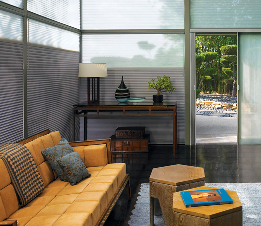 modern living room with yellow sofa and hunter douglas duette vertical shades Chagrin Falls