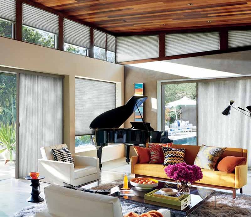 boho chic sunroom with glass doors and cellular window shades in Cleveland, OH