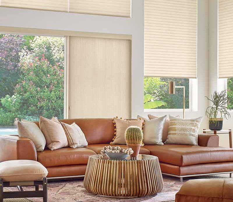 western boho living room with large windows and sliding glass window panels in Cleveland, OH