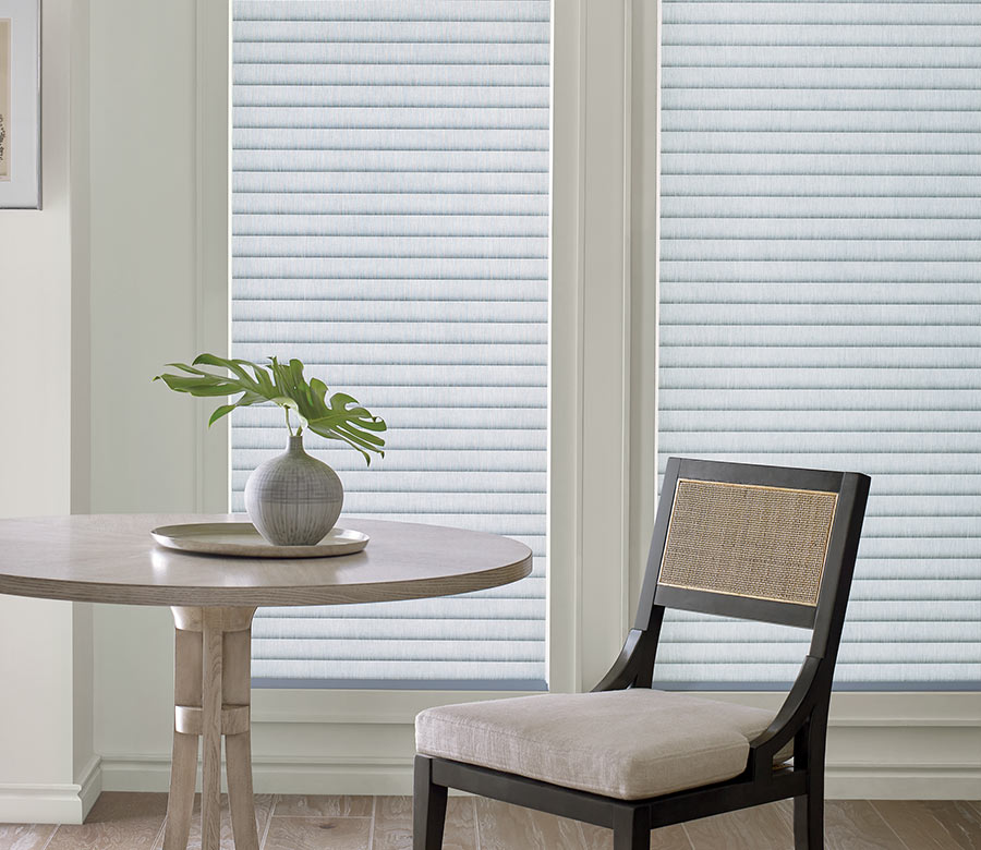 tall windows covered with insulating roller shades in Cleveland OH