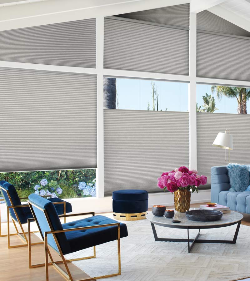 blue accent chairs in contemporary living room specialty shapes windows in Rocky River 44116