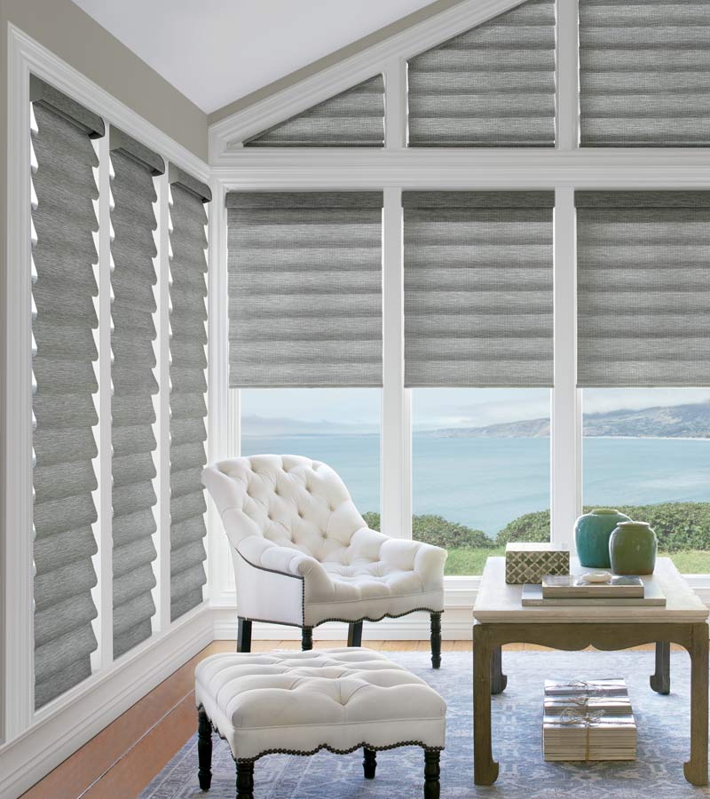 Traditional living room with white tufted white chair modern roman shades on specialty shapes with windows in Chagrin Falls 44022