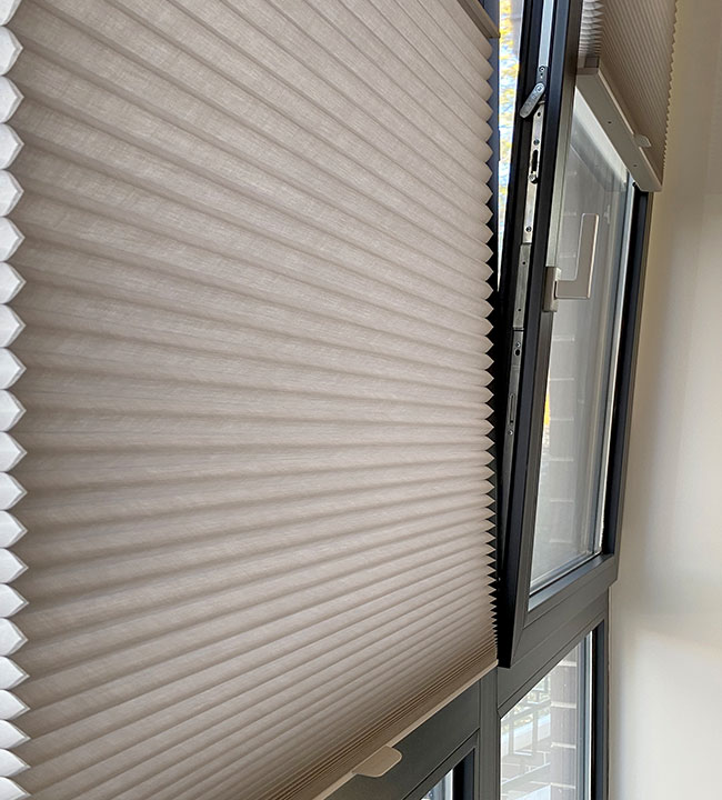 tilt in windows with gray cellular shades in Chagrin Falls OH