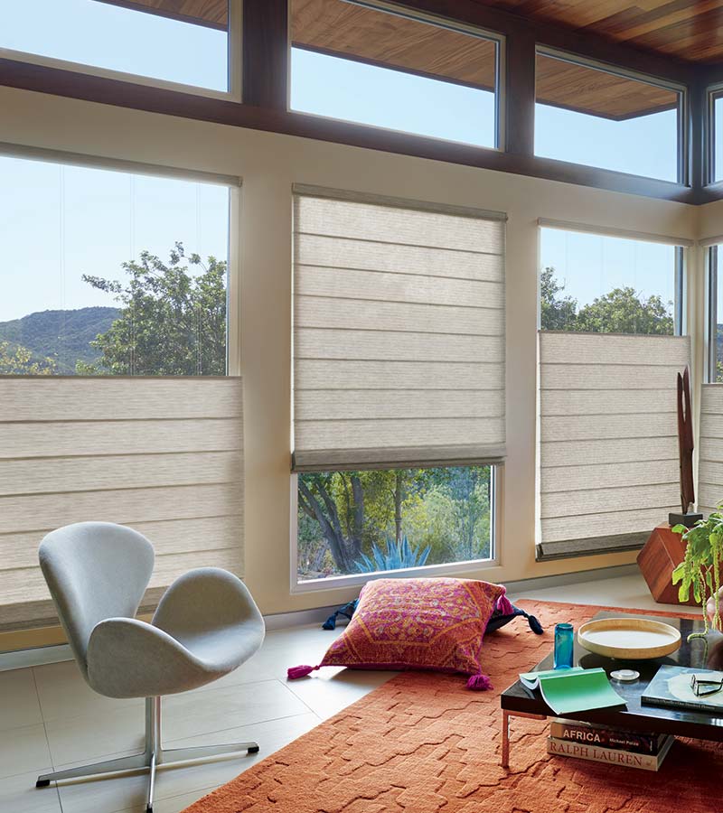 beige woven shades on loft living room windows in Cleveland OH