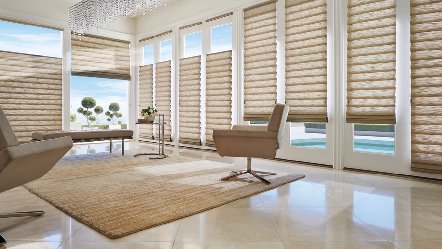 tall narrow windows covered with beige window treatments in Cleveland OH home