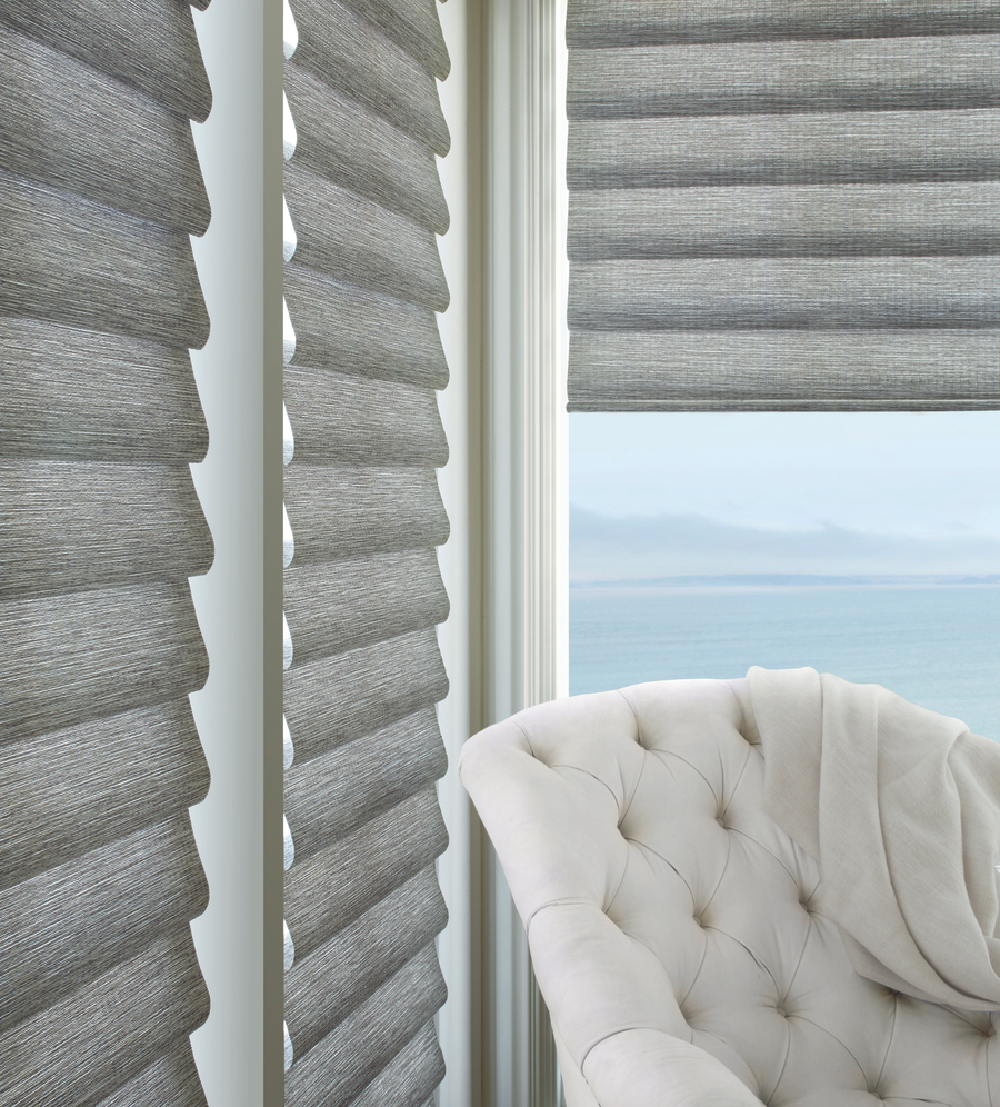gray custom roman shades on large windows overlooking Lake Erie