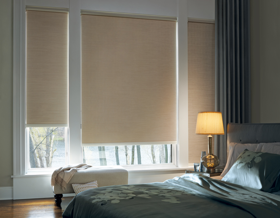 beautifully decorated guest bedroom Hunter Douglas room darkening roller shades Chagrin Falls 44022