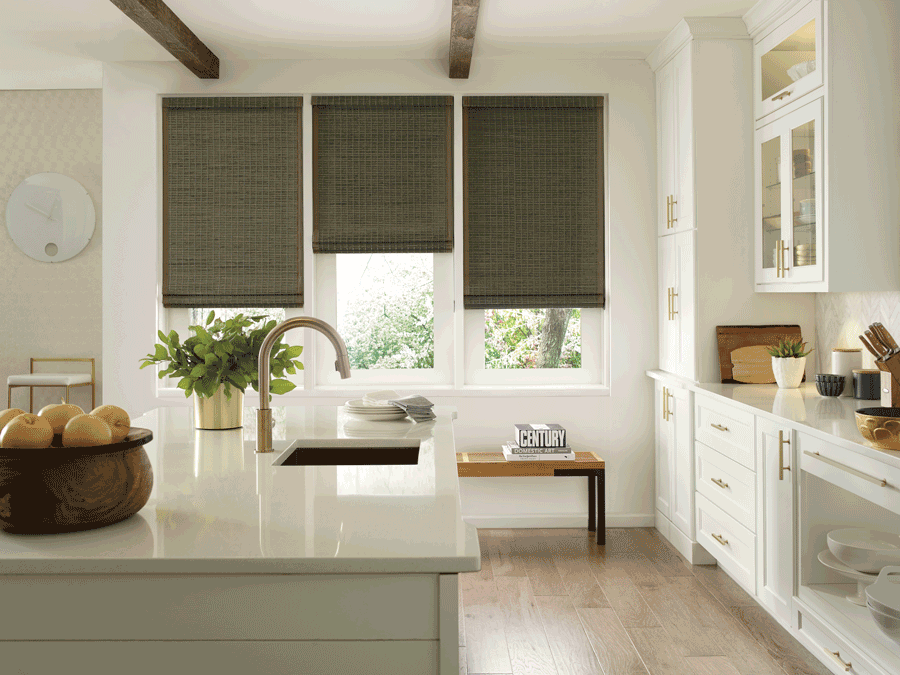 Contrasting farmhouse window treatments in cozy Cleveland home.