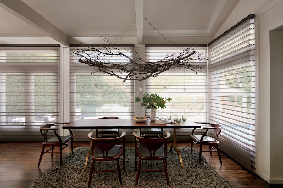 Sheer shades in dining room for added UV protection.