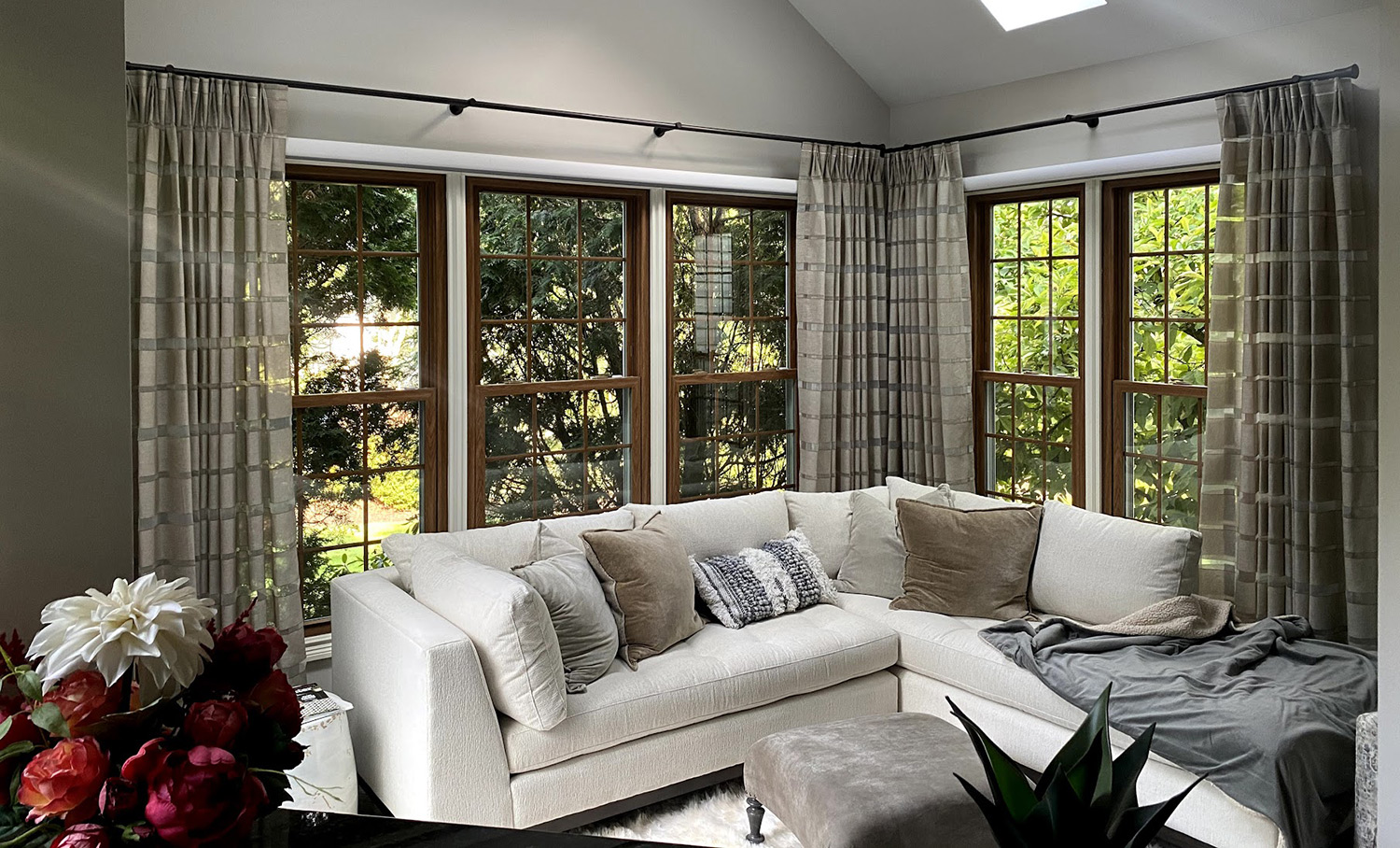 living room with taupe plaid drapes in Chagrin Falls OH