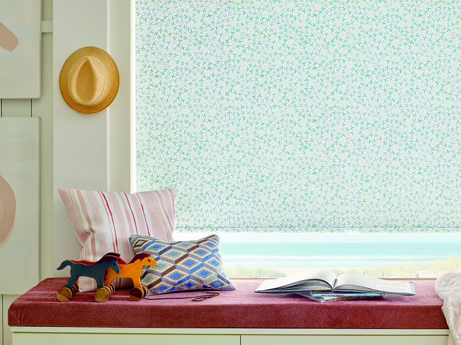 window seat patterned roller shades bedroom with pink curtains and patterned roller shades timan window treatments