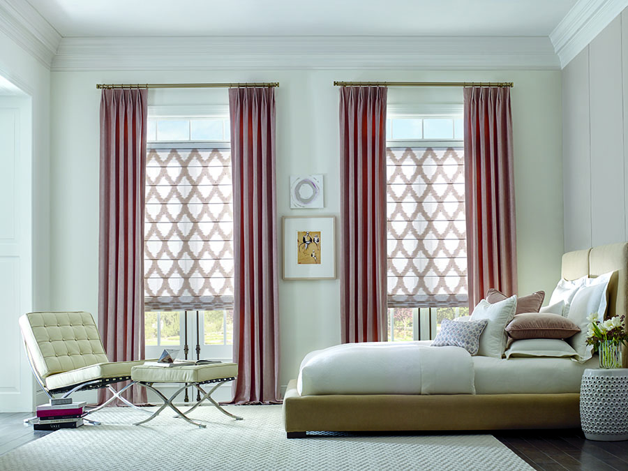 bedroom with pink curtains and patterned roller shades timan window treatments spring refresh