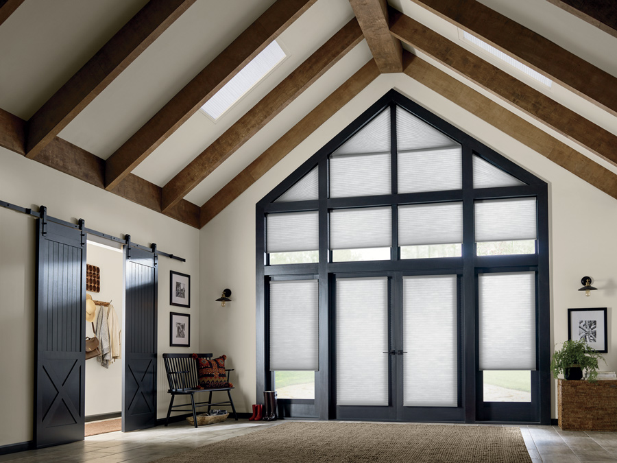 Large foyer with floor to ceiling windows