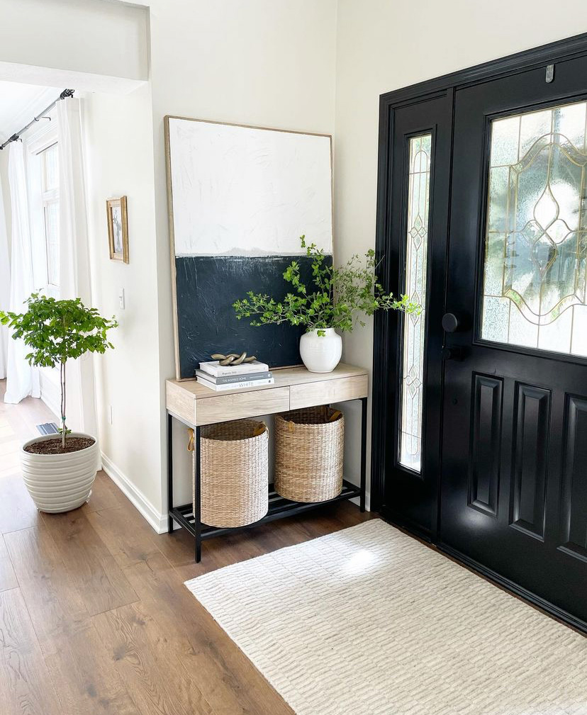 Entryway inspiration with natural wood entry table and woven baskets