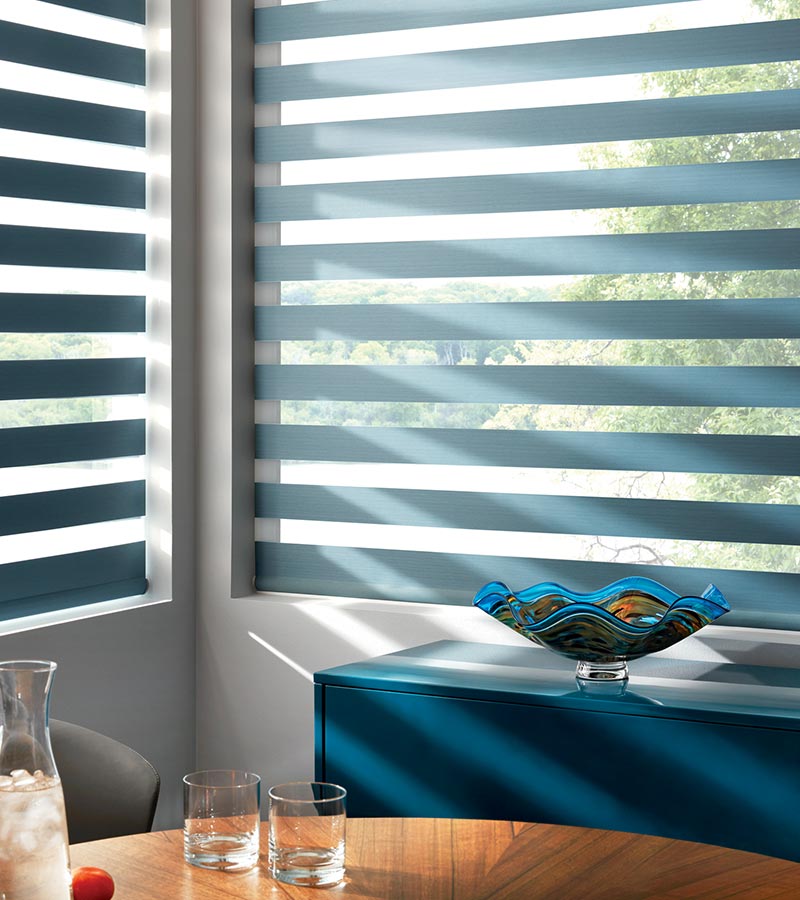 dual opacity blinds with light filtering capabilities in dining room in Chagrin Falls, OH