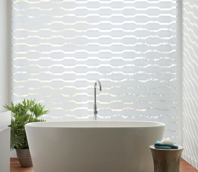 geometric pattern window shades with powerview automation in bathroom