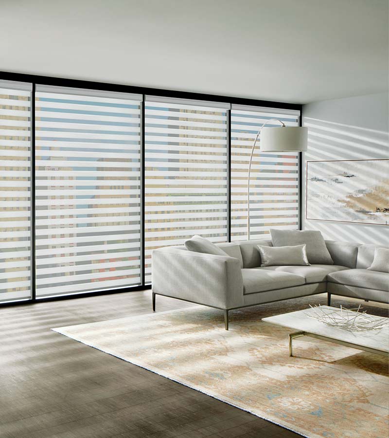 open concept condo highrise with light filtering banded shades in Akron, OH