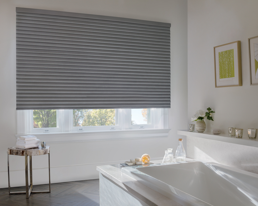 cellular roller shades on large window in Rocky River bathroom