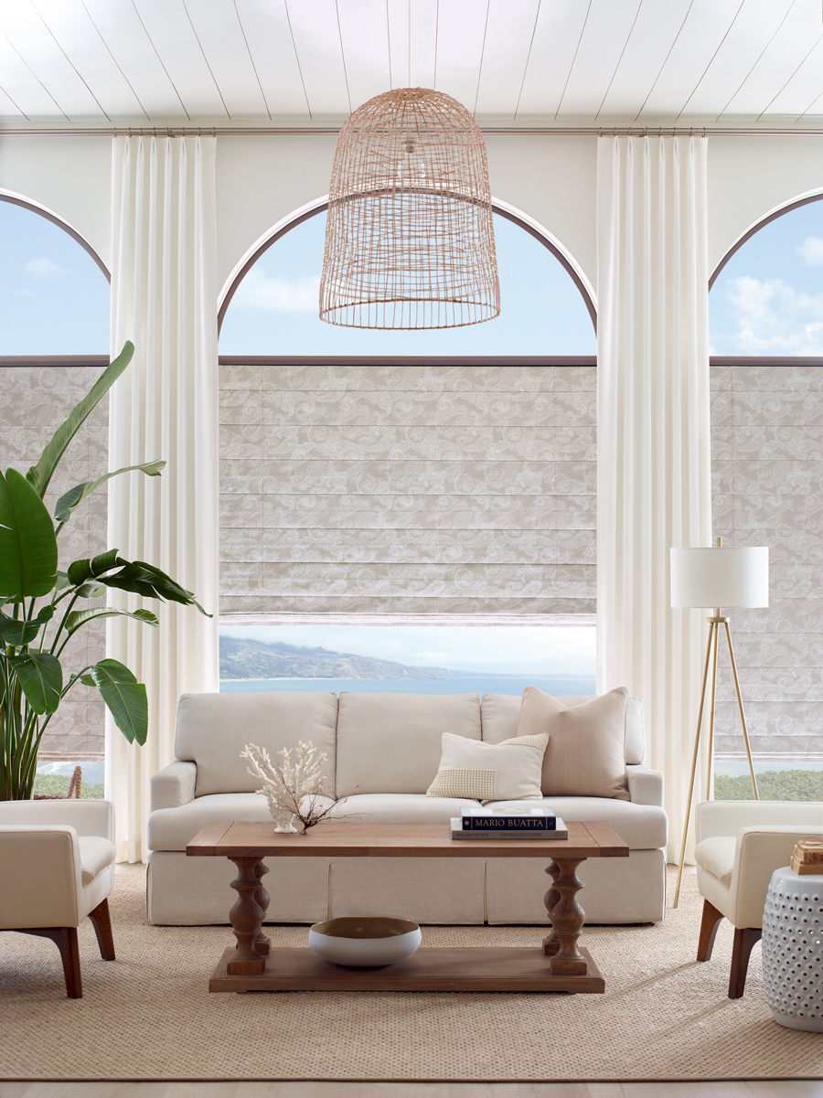 arched windows covered on the bottom by custom roller shades in Cleveland