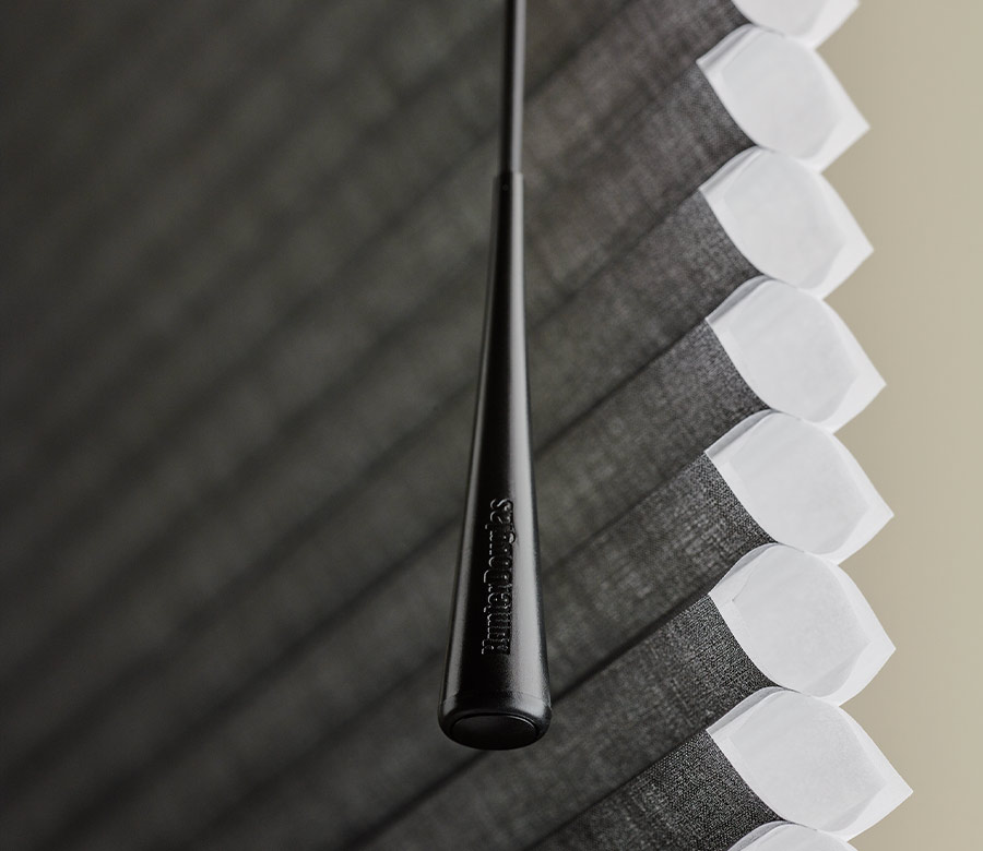 up close detail of operating wand for soft touch window treatment solution Akron, OH