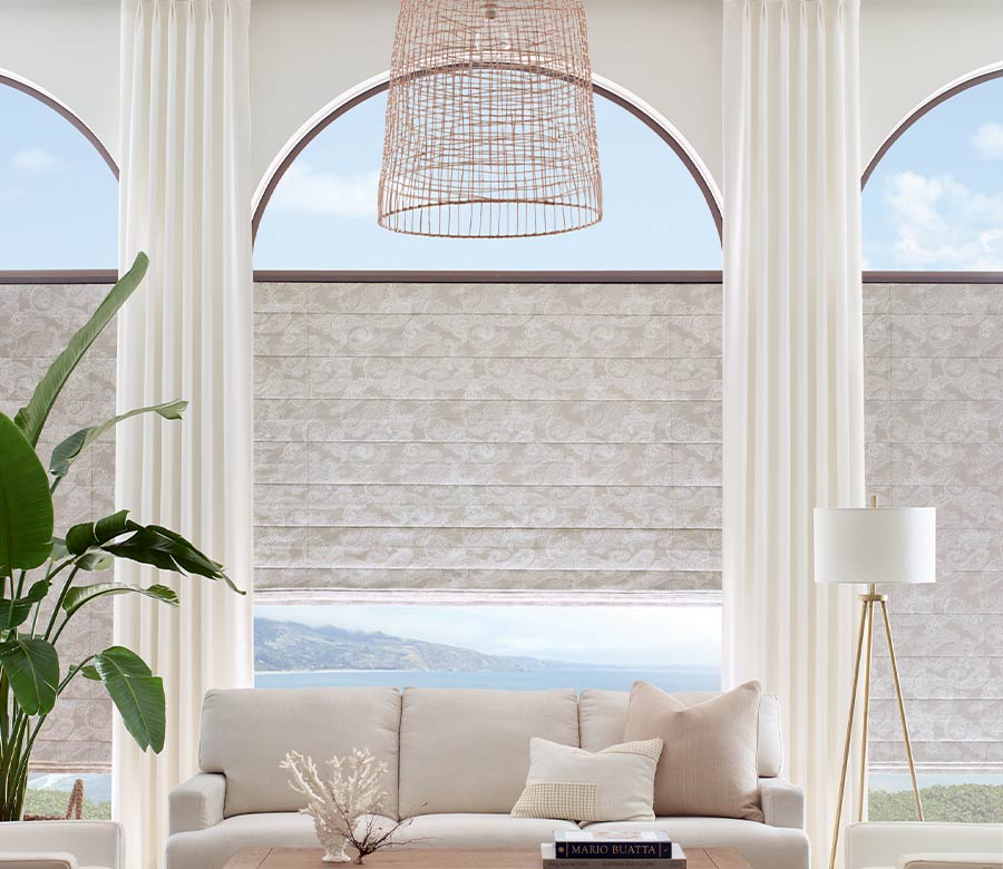 floor to ceiling arched windows in modern neutral living room Cleveland, OH