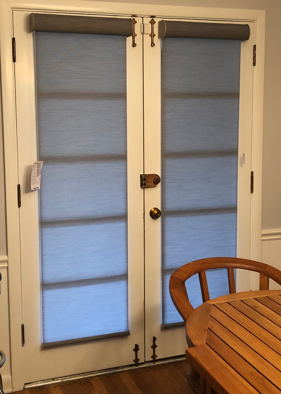 roller shades on interior french doors in home office