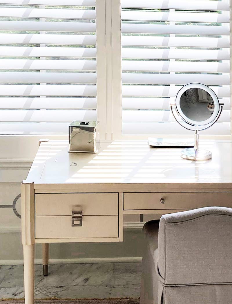white vanity shutters in master bathroom suite cleveland, OH