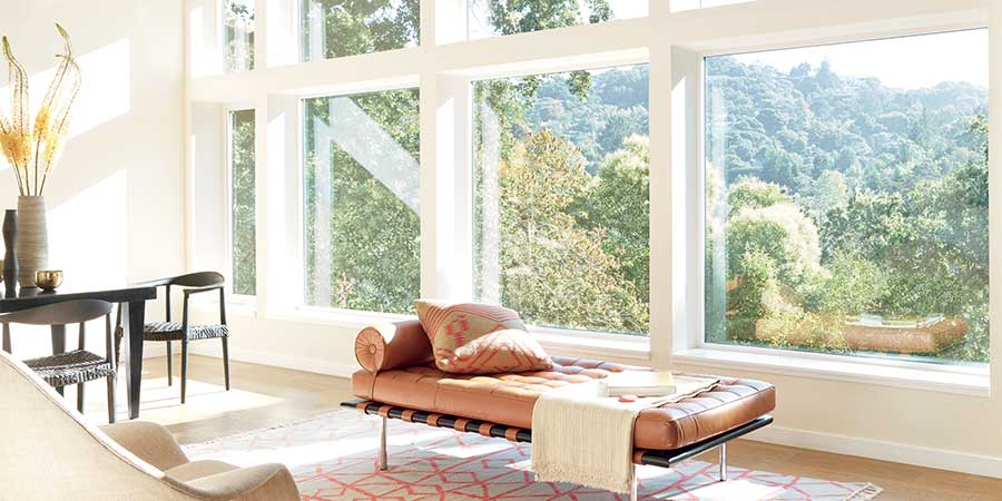 cover your windows no window treatments on windows in living room