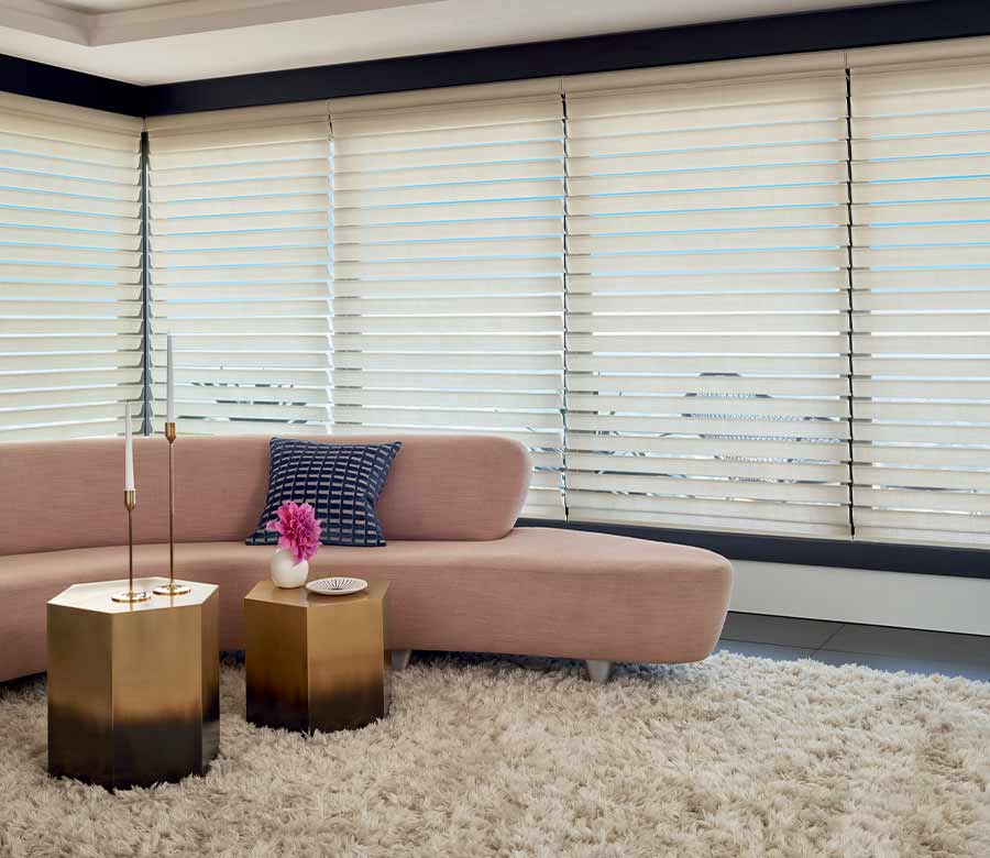 contemporary living room pink couch and silhouette hunter douglas shades