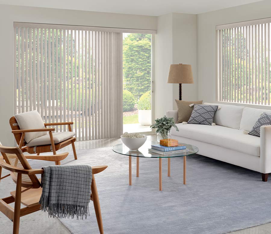 slightly open sheer shades on glass door in contemporary living space