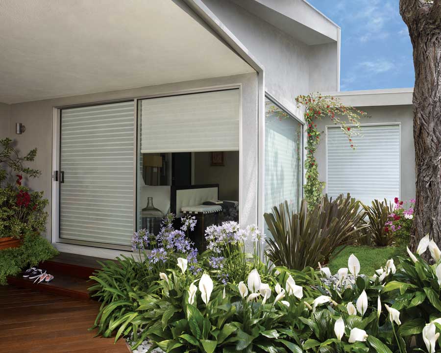 Exterior of home with large windows