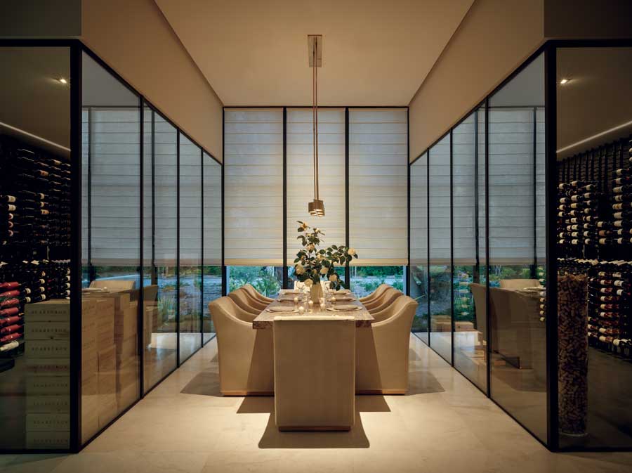 Dining room lined with mirrors