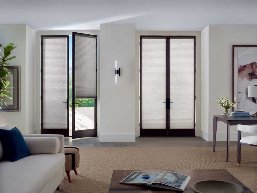 french doors duette honeycomb on sliders in open floor plan home cleveland, oh