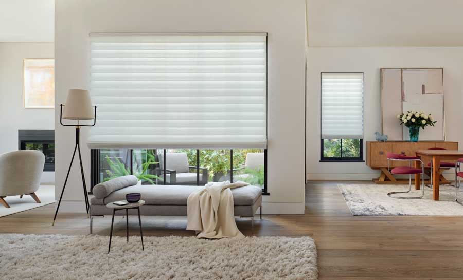 Roman shades in cleveland living room in open floor plan home
