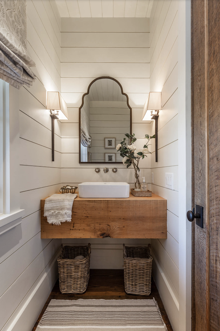 small powder room with shiplap