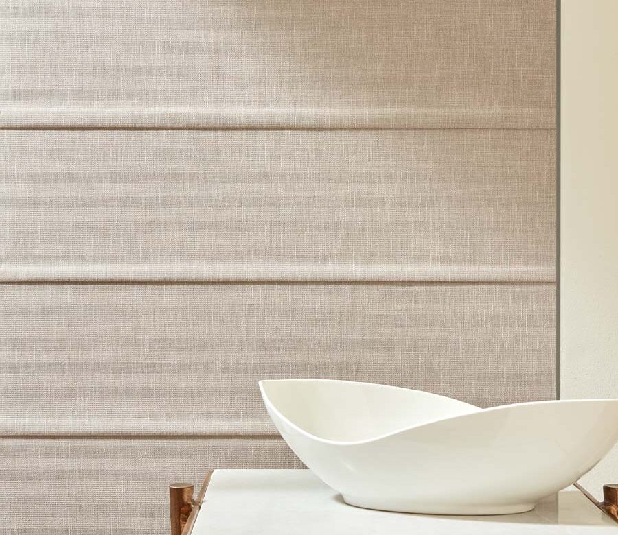ceramic pottery next to soft beige colored shades
