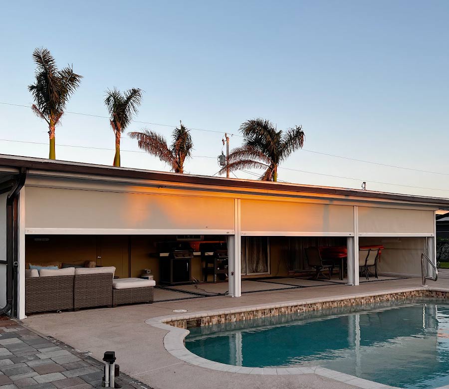poolside patio with outdoor roller shades