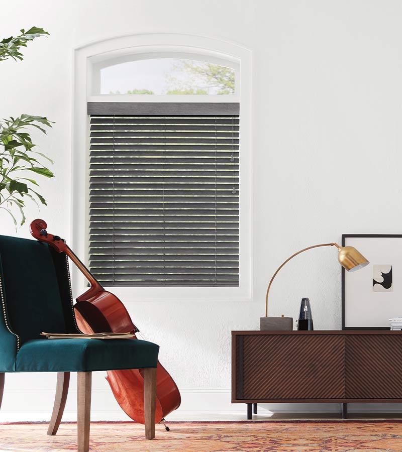 gray wood horizontal blinds for arched window in music room of Auburn Oh area home
