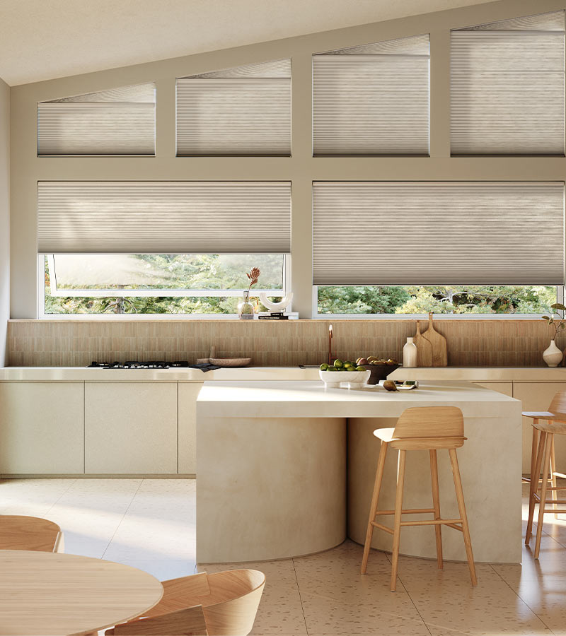 angled windows in contemporary kitchen space cellular shades in beige color in Westlake OH home