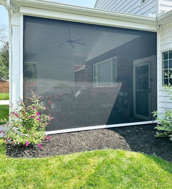 large patio screen shades on exterior of Avon lake OH home