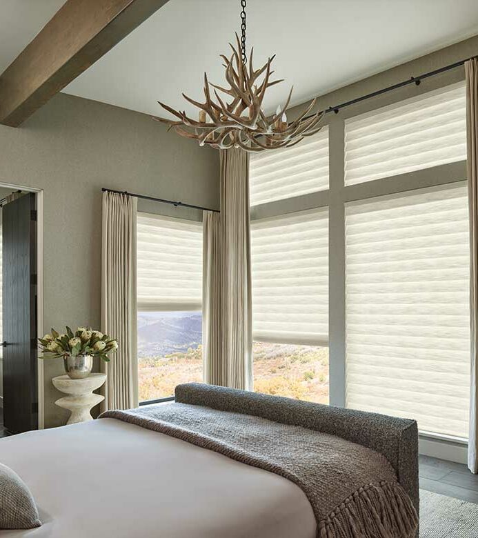 after photo of roman shades opened with light coming from the top of the shade