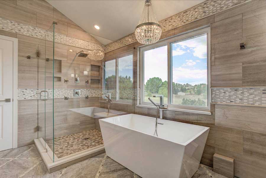chandelier over free-standing tub