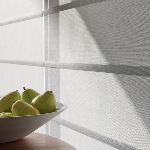 gray roller shades with batten details