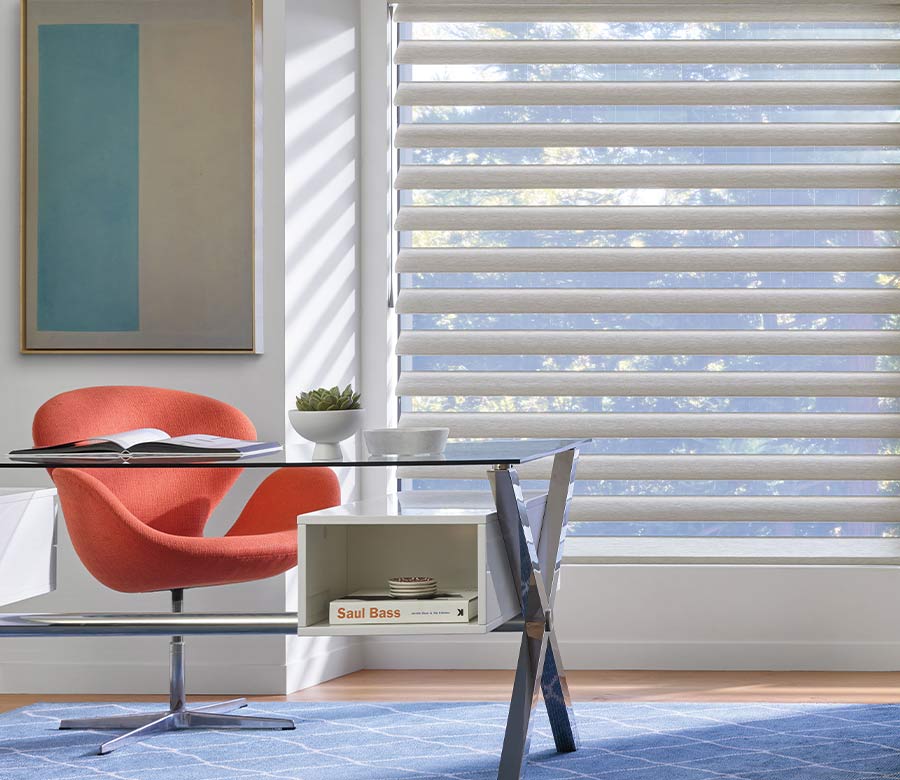 home office for creative designer peach fuzz office chair and large window treatments for glare control