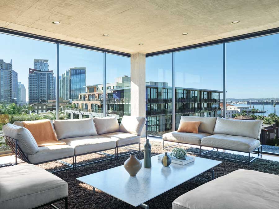 Floor to ceiling windows in a modern city high-rise apartment