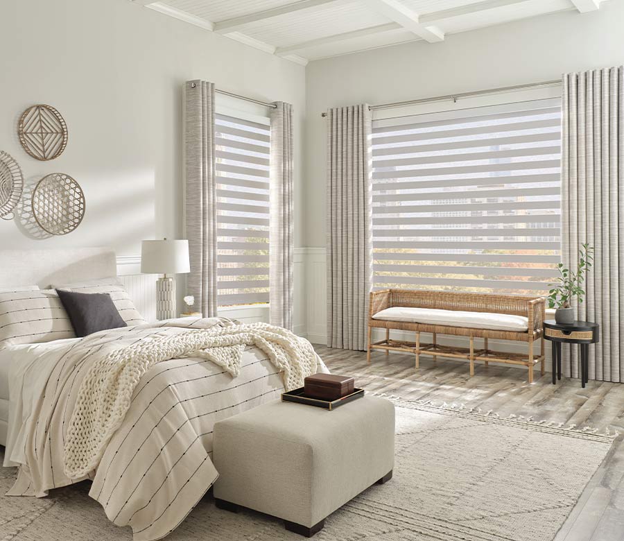 White Bedroom with Roller Zebra Shades on Windows with Side Drapes