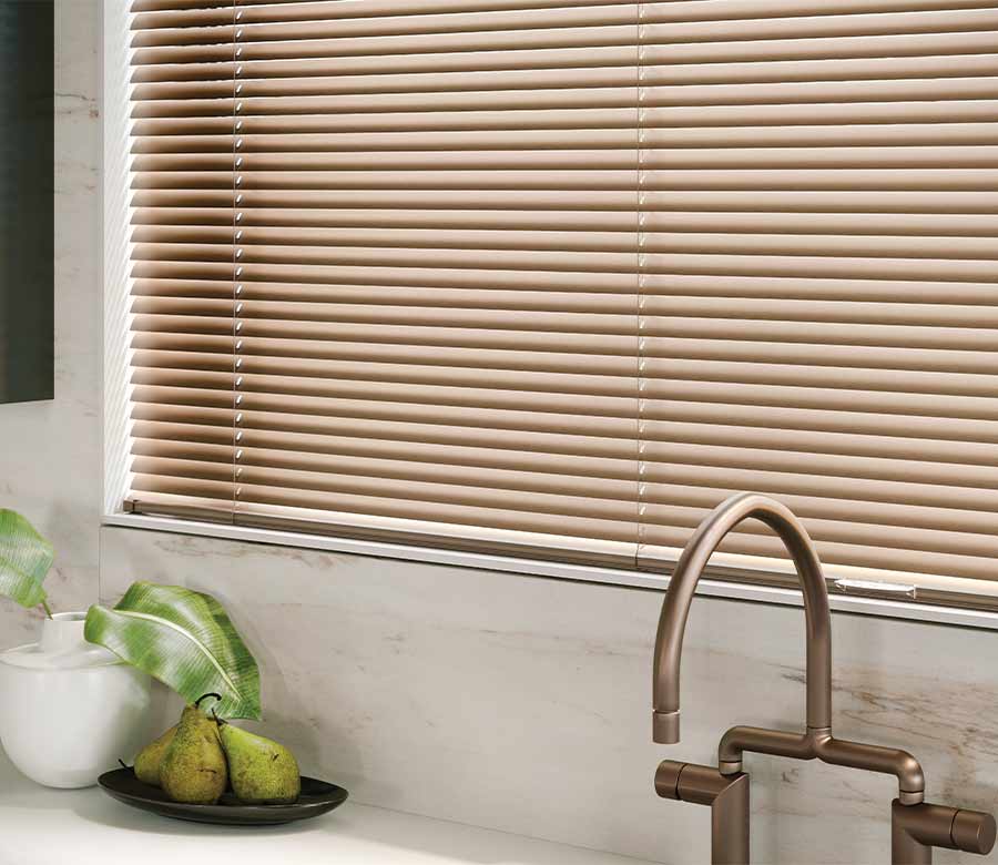 window behind kitchen sink with copper-colored aluminum blinds and cordless lift rocky river ohio