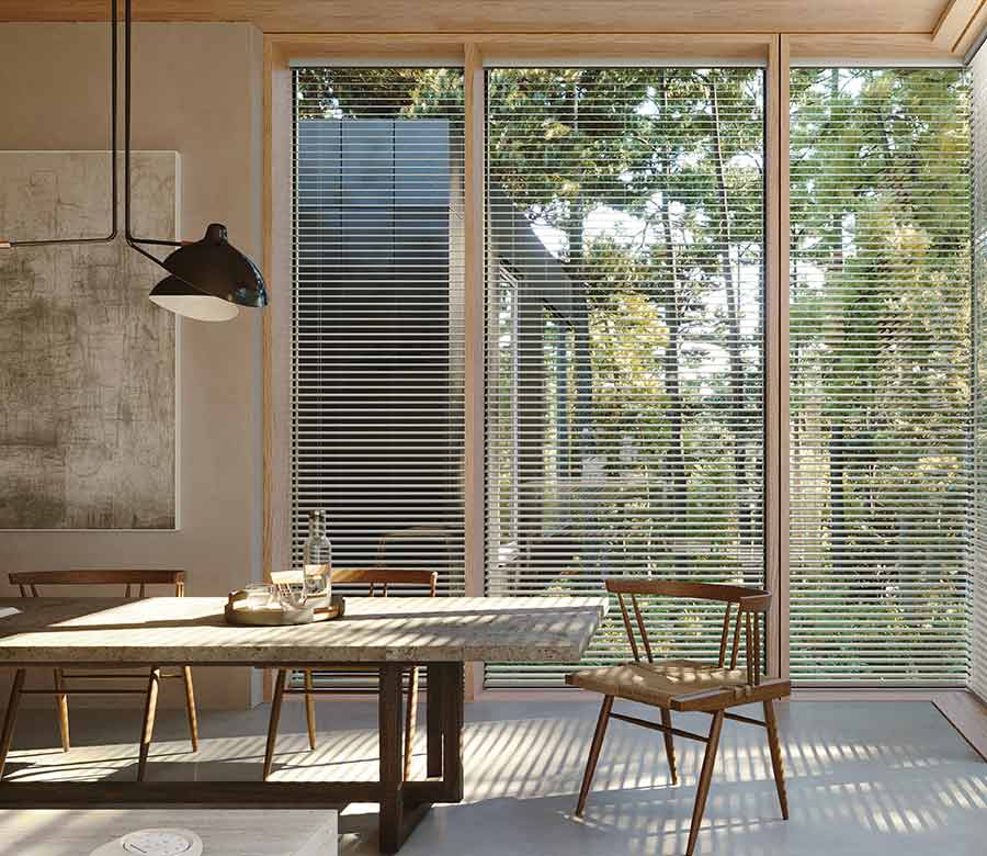 open venetian blinds in kitchen surrounded by windows cleveland ohio